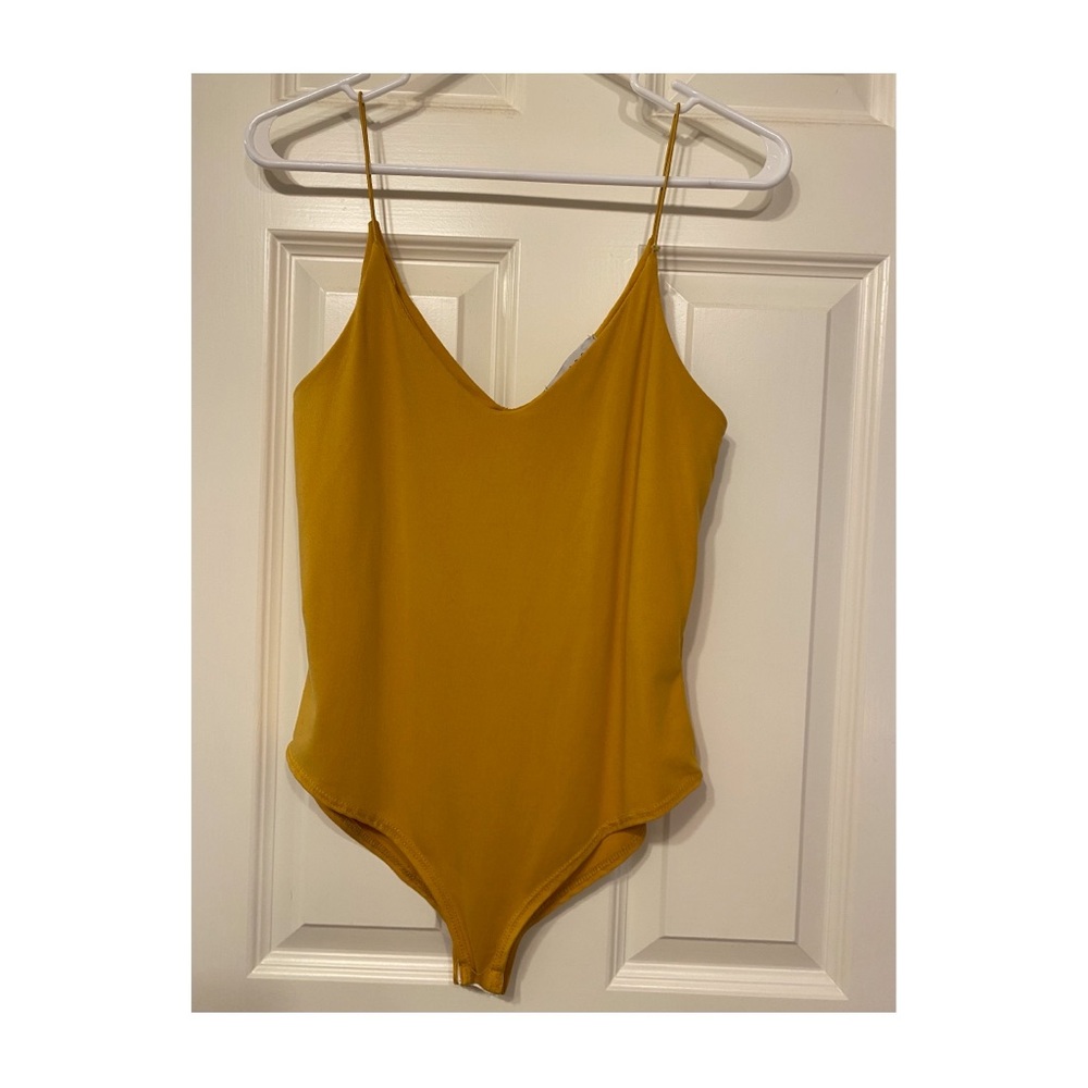 mustard colored bodysuit